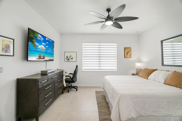 a bathroom with a double vanity sink mirror and shower