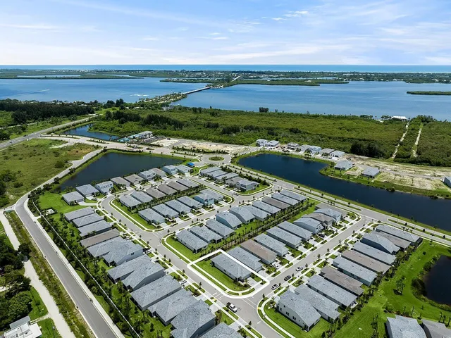 a view of a city with an ocean