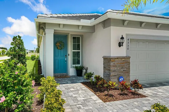a very nice looking room with a dining table chairs