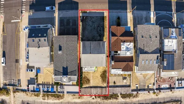 a aerial view of multi story residential apartment building
