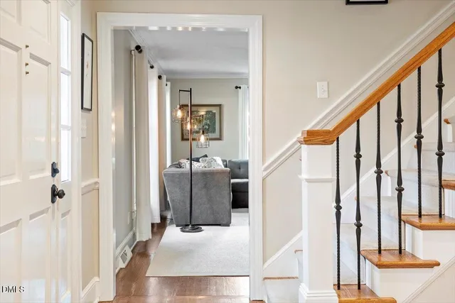 a view of living room with furniture and a large window