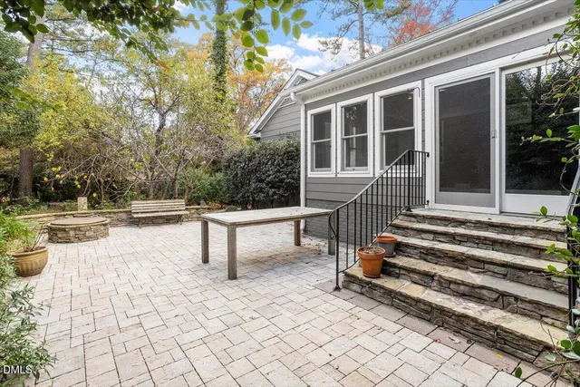 swimming pool view with a outdoor seating