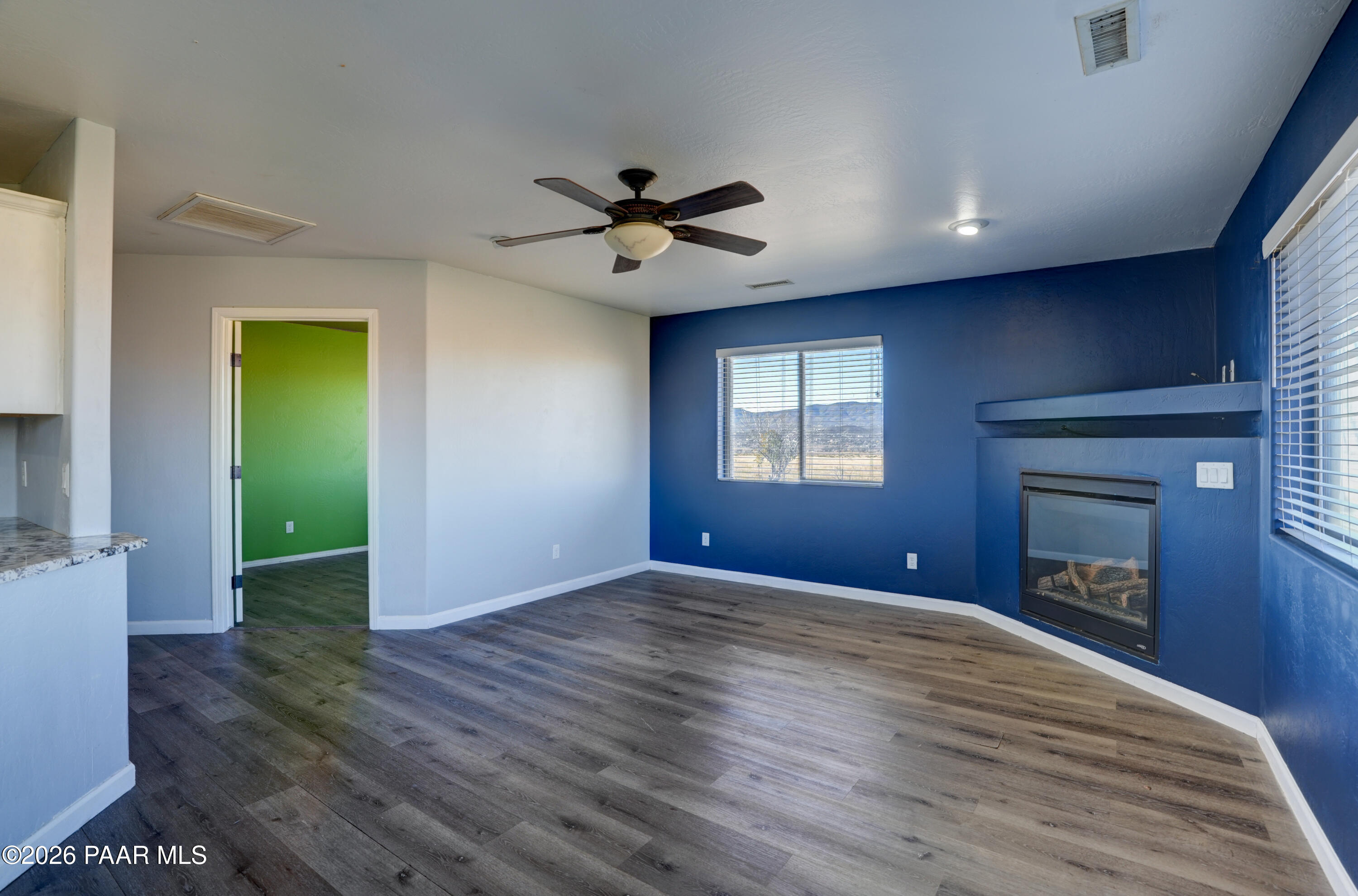 200 North Outback Road Dewey, AZ 86327 - Photo 11 of 34 a view of empty room with wooden floor and fan