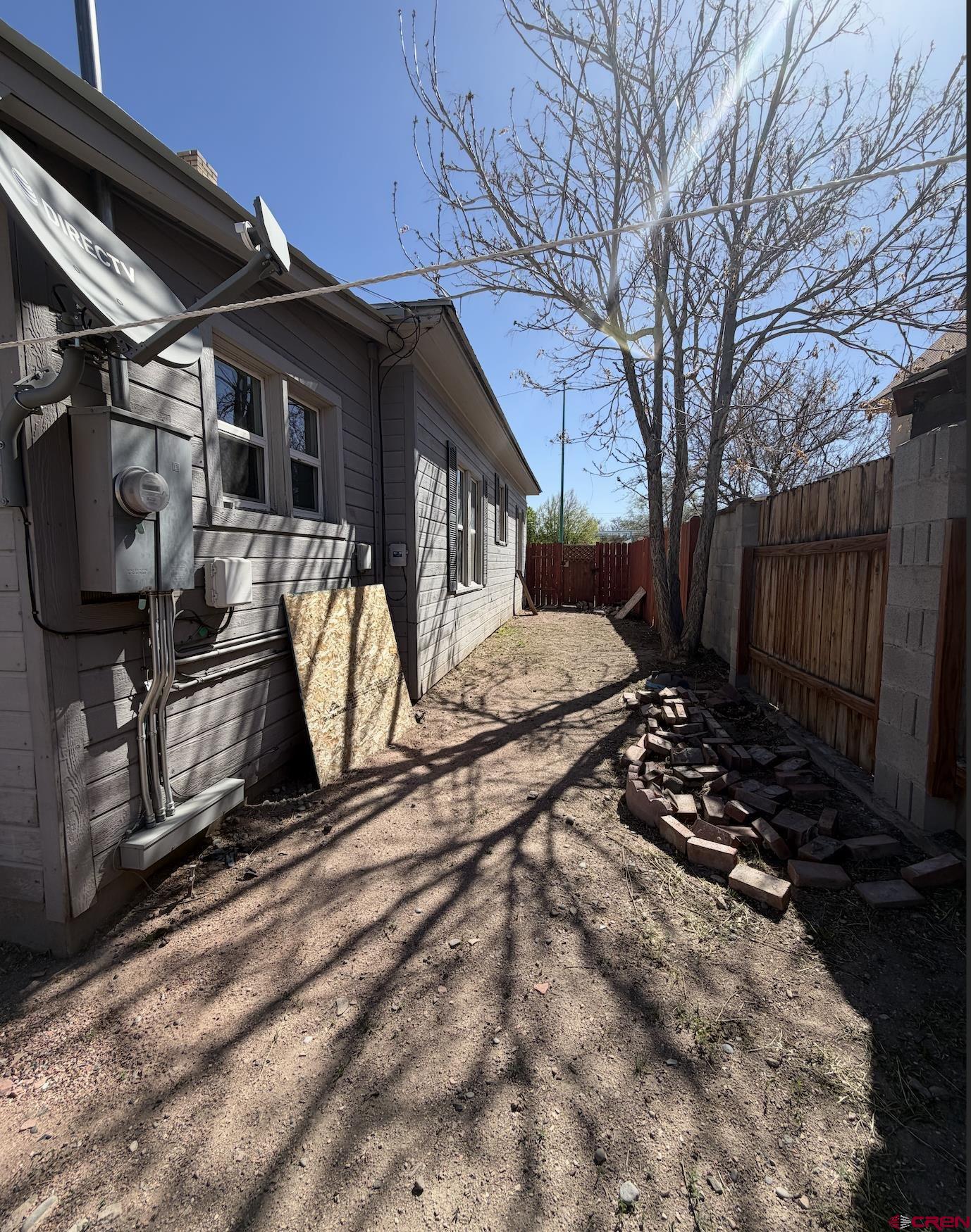 1001 Main Street Delta, CO 81416 - Photo 21 of 29 a view of a house with a yard