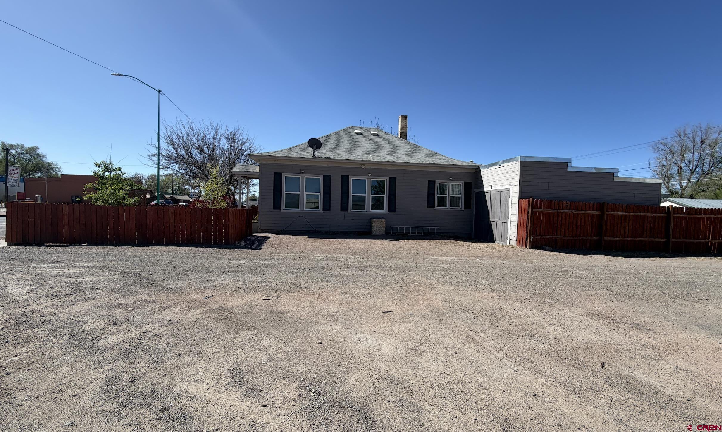 1001 Main Street Delta, CO 81416 - Photo 28 of 29 a front view of a house with a yard