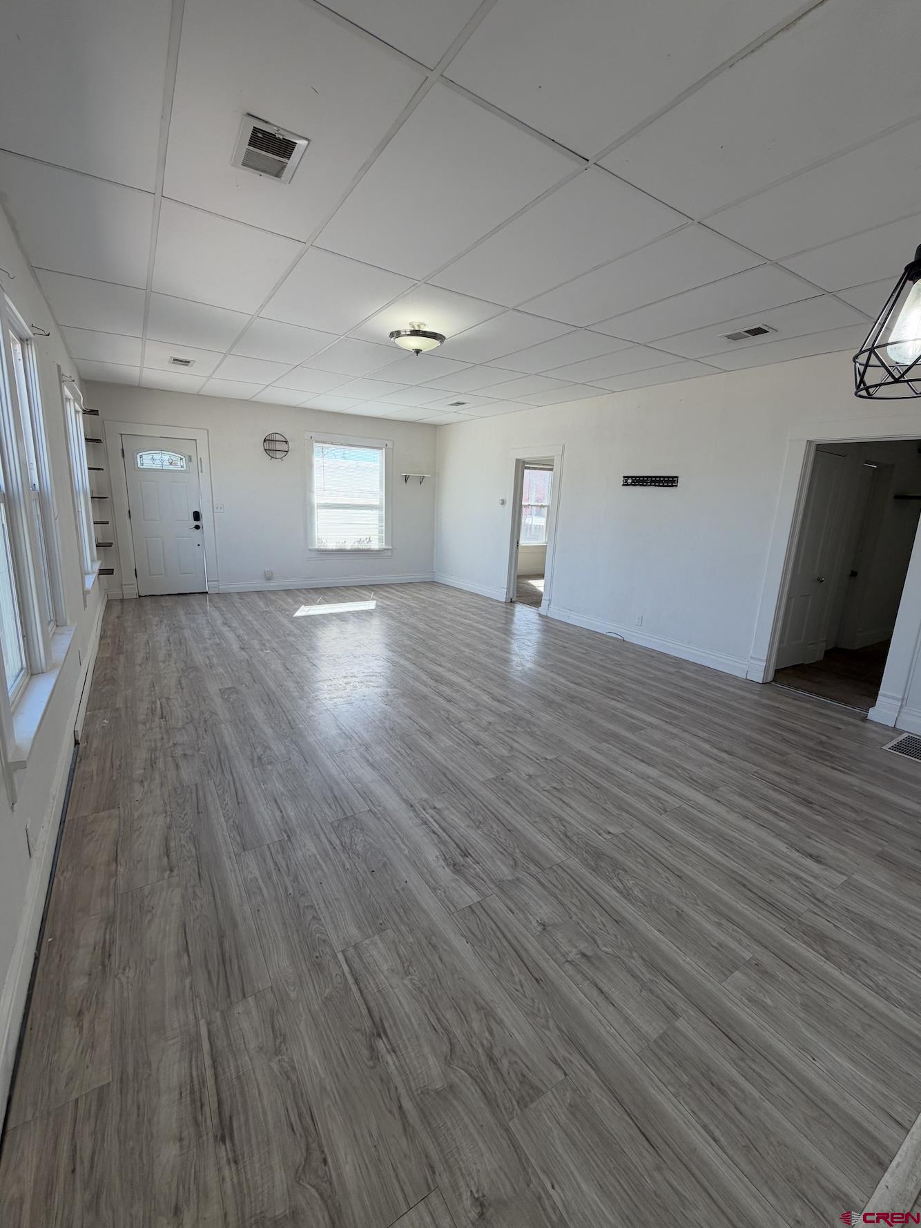 1001 Main Street Delta, CO 81416 - Photo 3 of 29 a view of an empty room and wooden floor