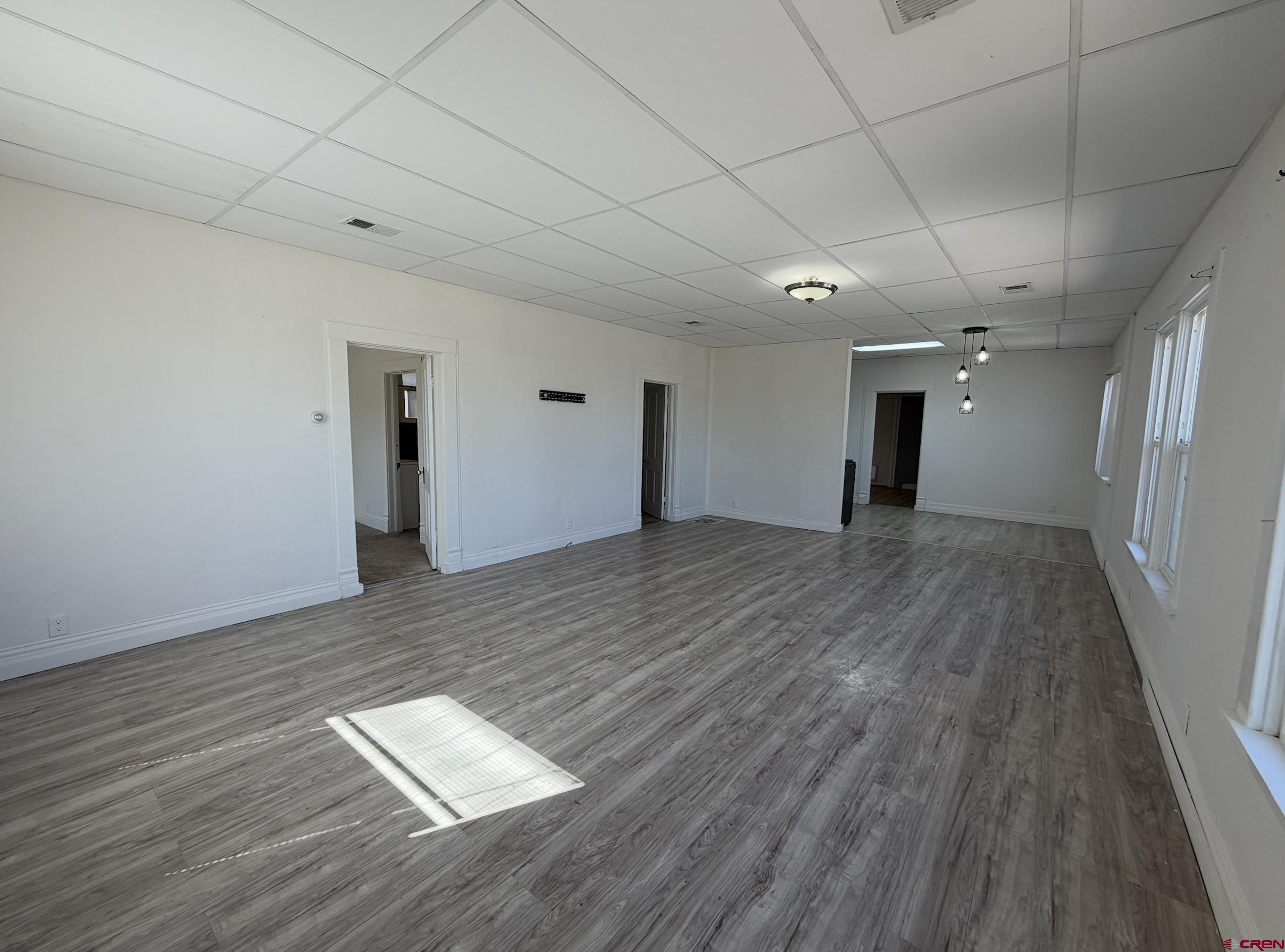 1001 Main Street Delta, CO 81416 - Photo 6 of 29 a view of empty room with wooden floor