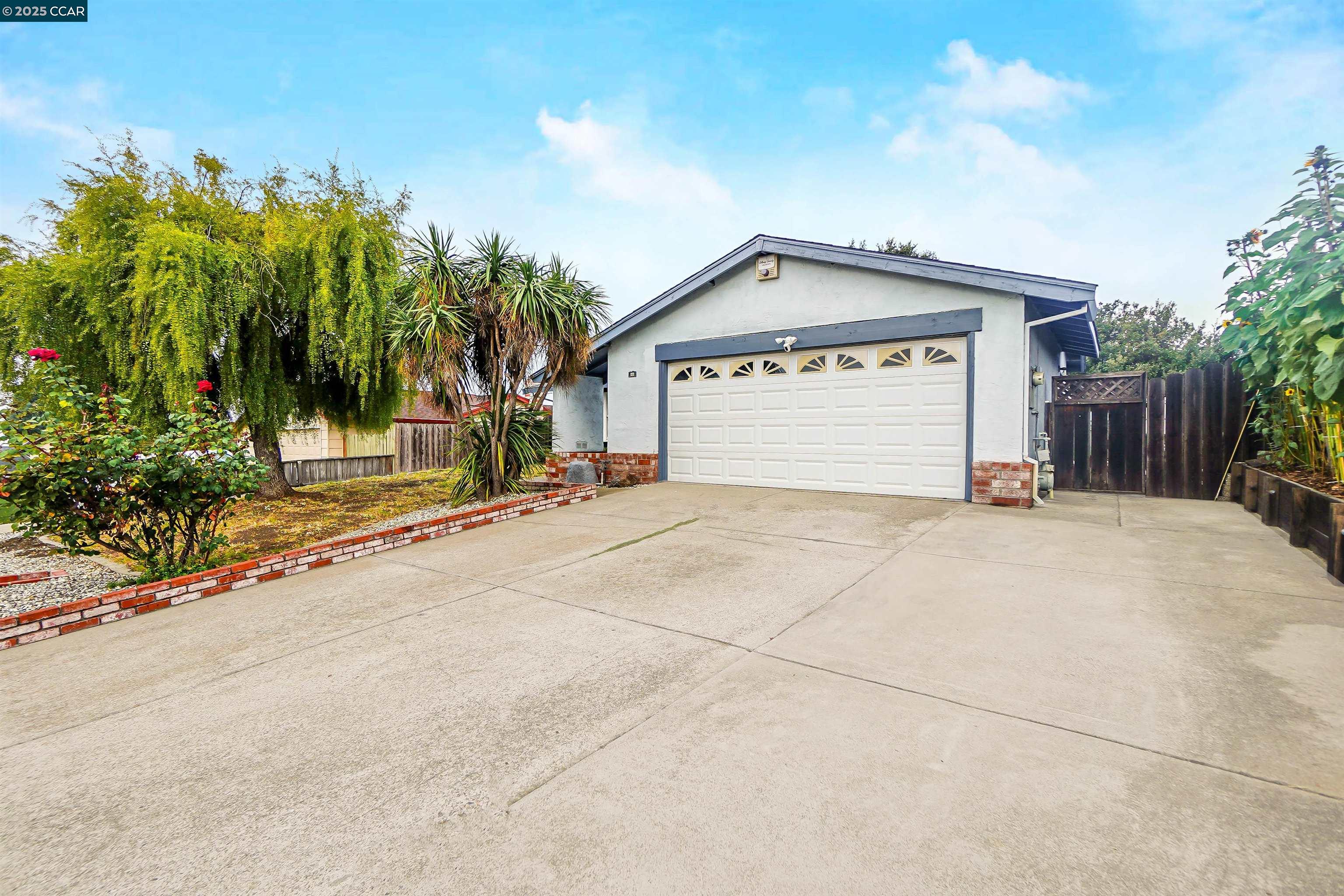 a view of garage and yard