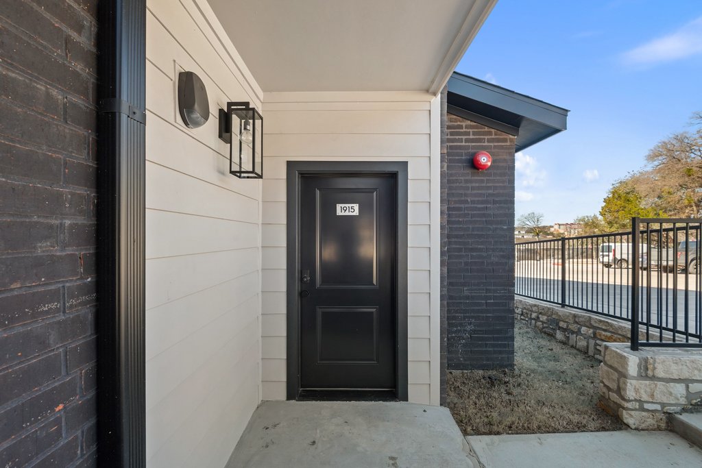 2450 Wickersham Lane, Unit 1927 Austin, TX 78741 - Photo 38 of 40 a view of a door and a window