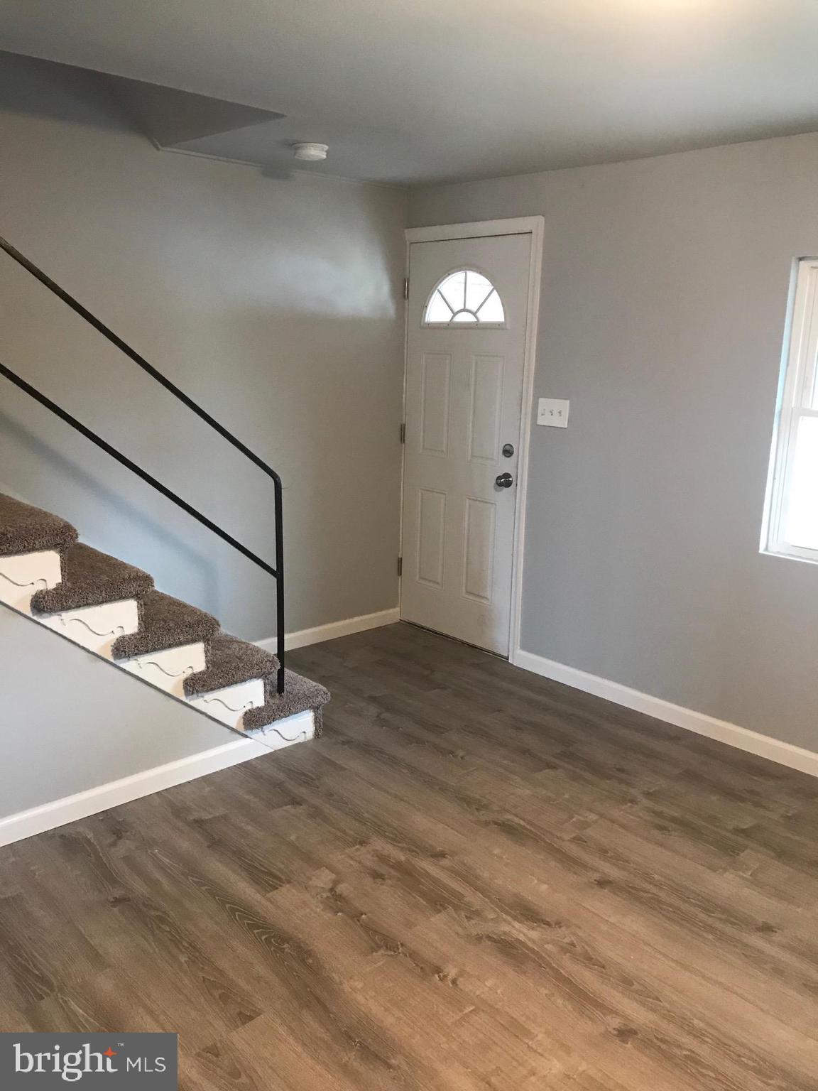 7950 Wynbrook Road Baltimore, MD 21224 - Photo 12 of 22 Rear exit to covered rear porch & private parking