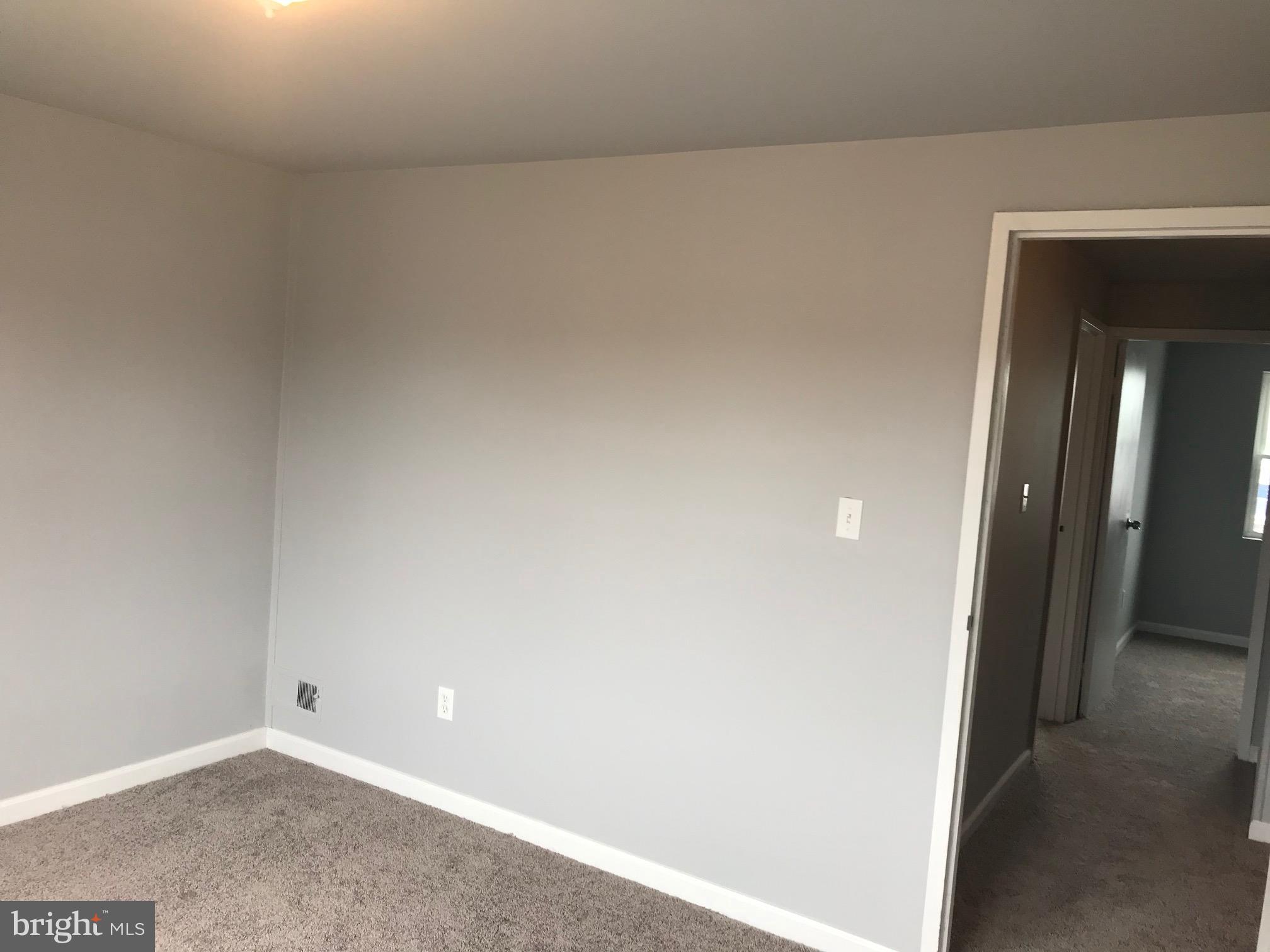 7950 Wynbrook Road Baltimore, MD 21224 - Photo 16 of 22 Bedroom 1 - Large rear bedroom