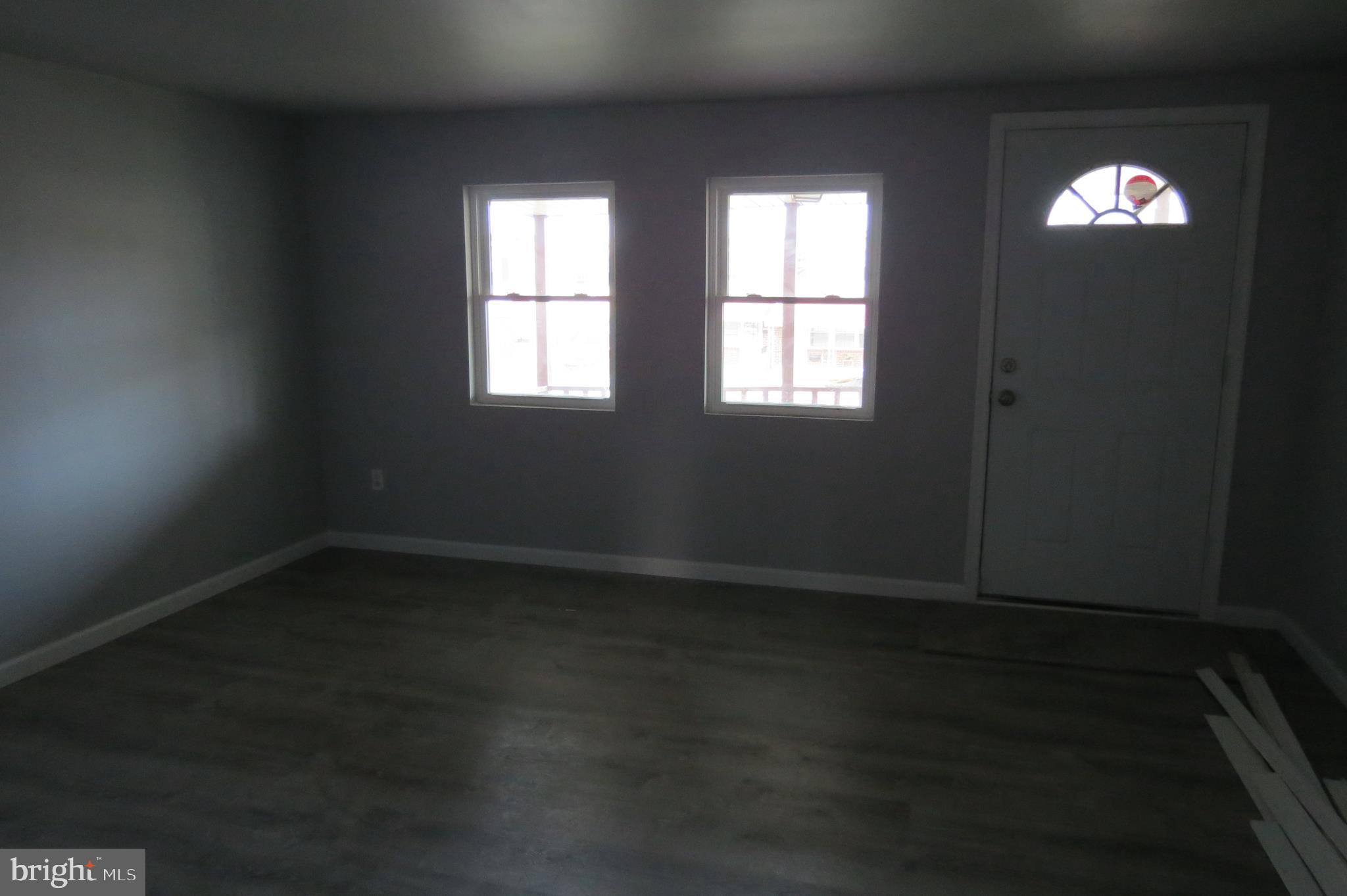7950 Wynbrook Road Baltimore, MD 21224 - Photo 5 of 22 Spacious living room with natural light