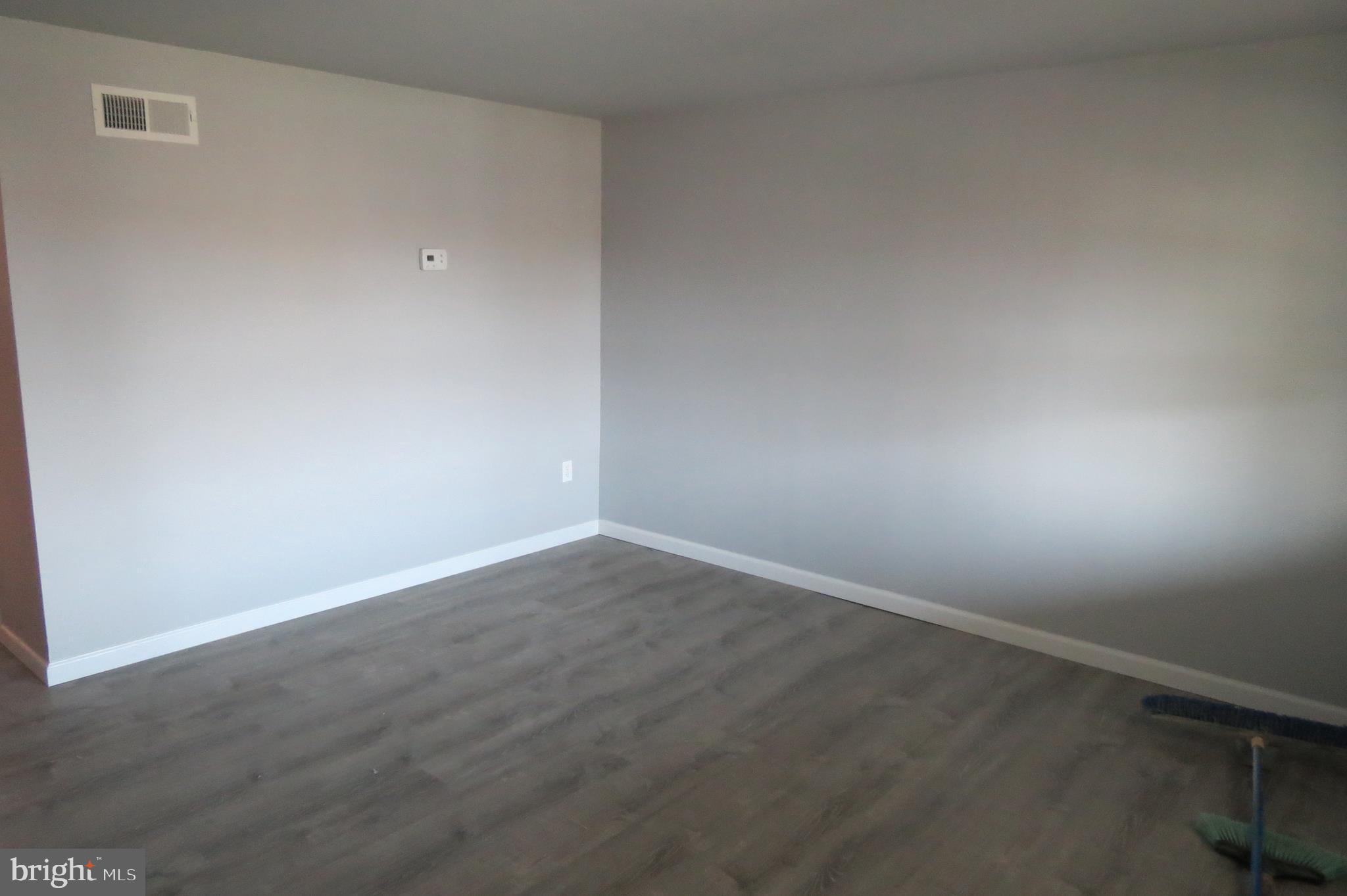 7950 Wynbrook Road Baltimore, MD 21224 - Photo 6 of 22 Lifeproof flooring through the main floor