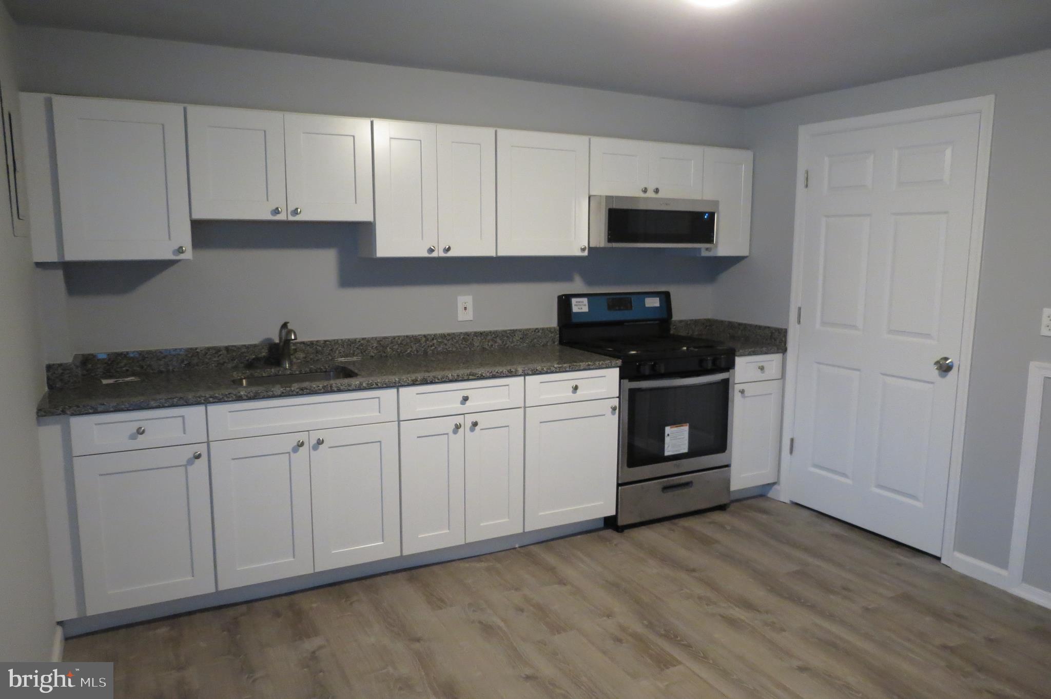 7950 Wynbrook Road Baltimore, MD 21224 - Photo 10 of 22 Granite Countertops, new appliances
