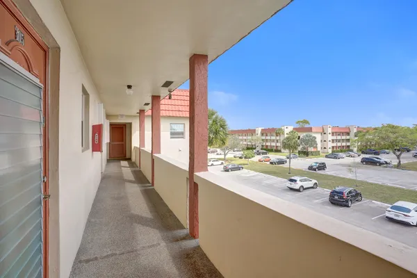 a view of a city from a hallway
