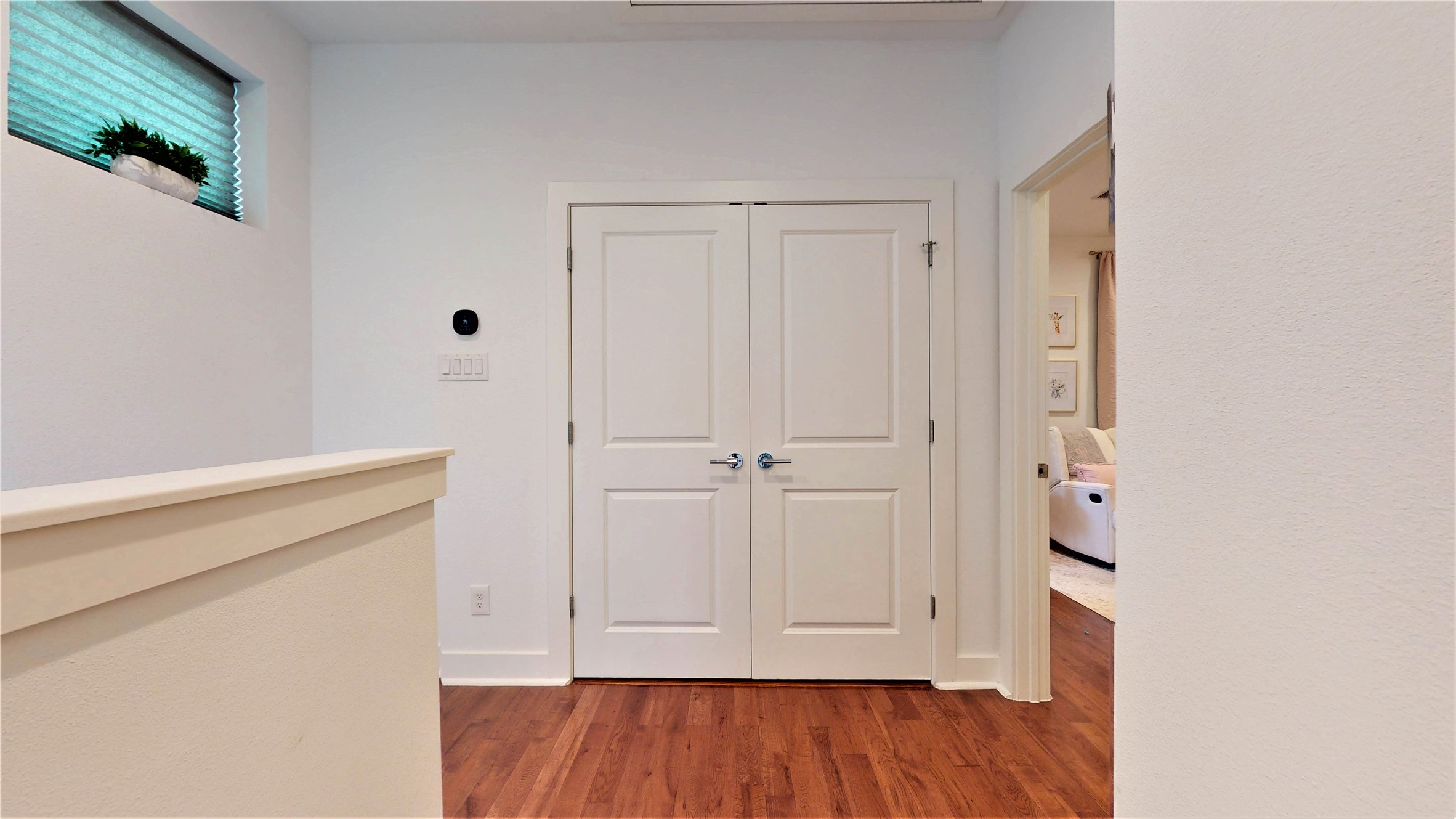 5422 Darling Street, Unit C Houston, TX 77007 - Photo 24 of 35 3rd Floor Living Space/ Washer Dryer Closet / Smart Thermostat
