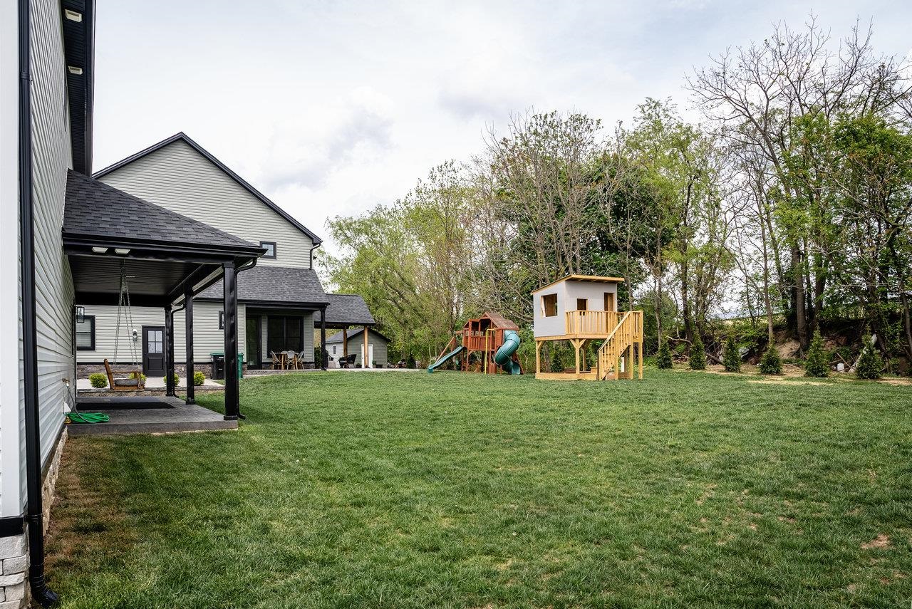 130 Millview Drive Bridgewater, VA 22812 - Photo 16 of 74 a view of a house with a yard and sitting area