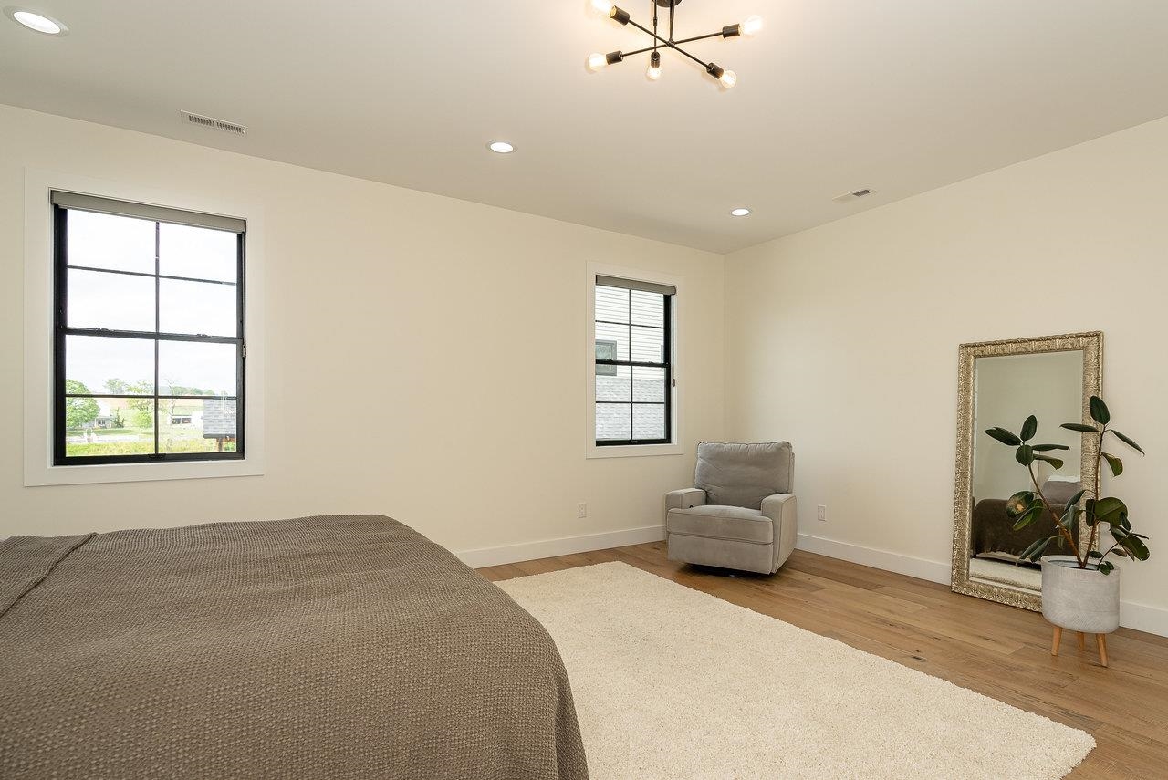 130 Millview Drive Bridgewater, VA 22812 - Photo 62 of 74 a bedroom with a bed and couch