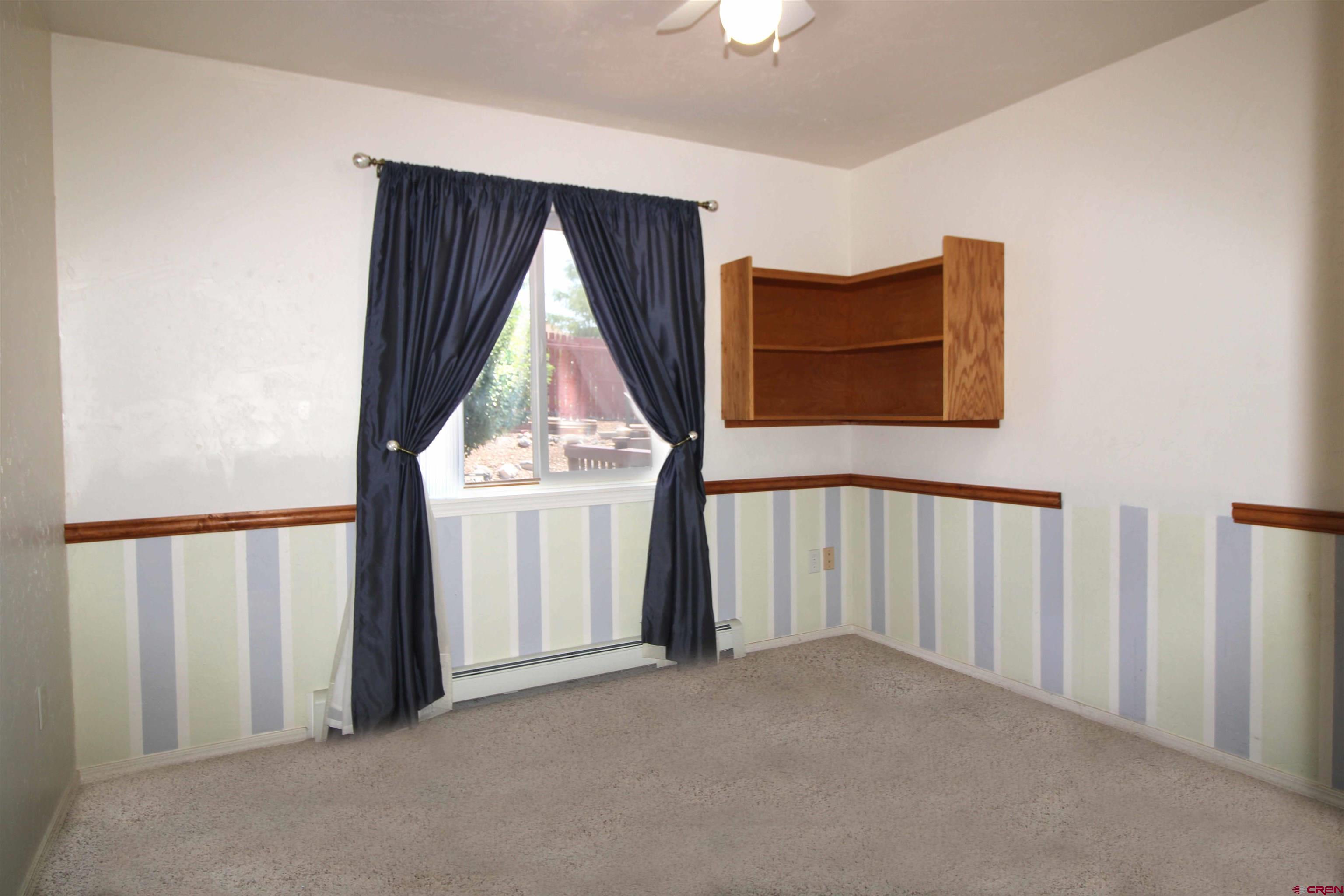 185-165 Northwest 11th Street Cedaredge, CO 81413 - Photo 17 of 34 a view of entryway with a small yard