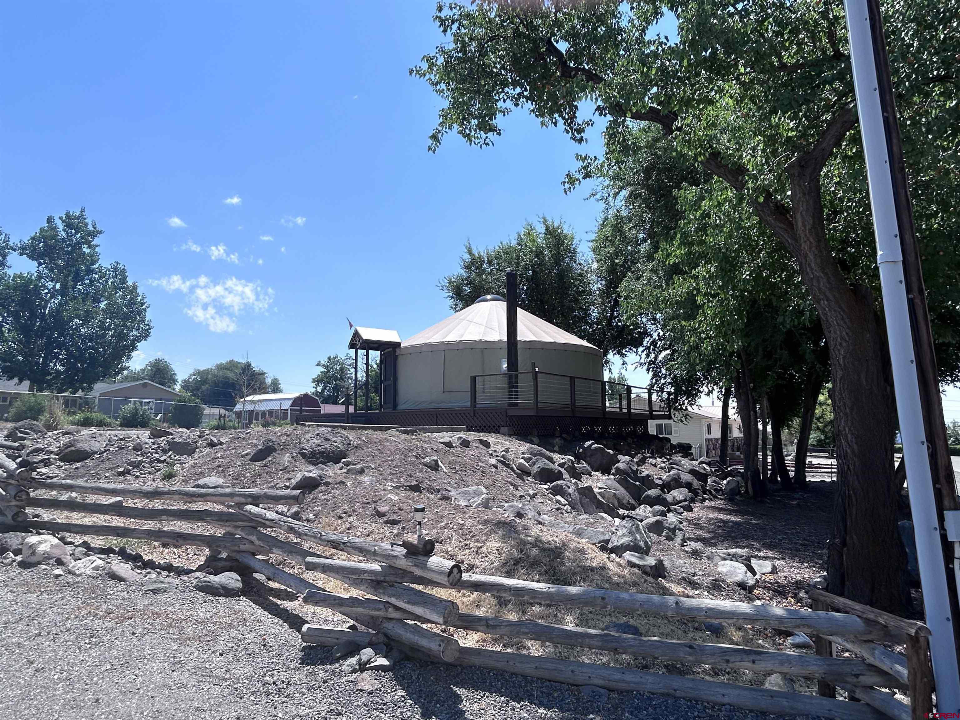 185-165 Northwest 11th Street Cedaredge, CO 81413 - Photo 26 of 34 a dirt road with trees in the background