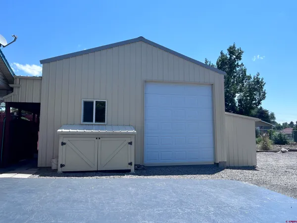 a house view with a backyard space
