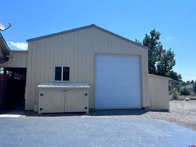 a house view with a backyard space