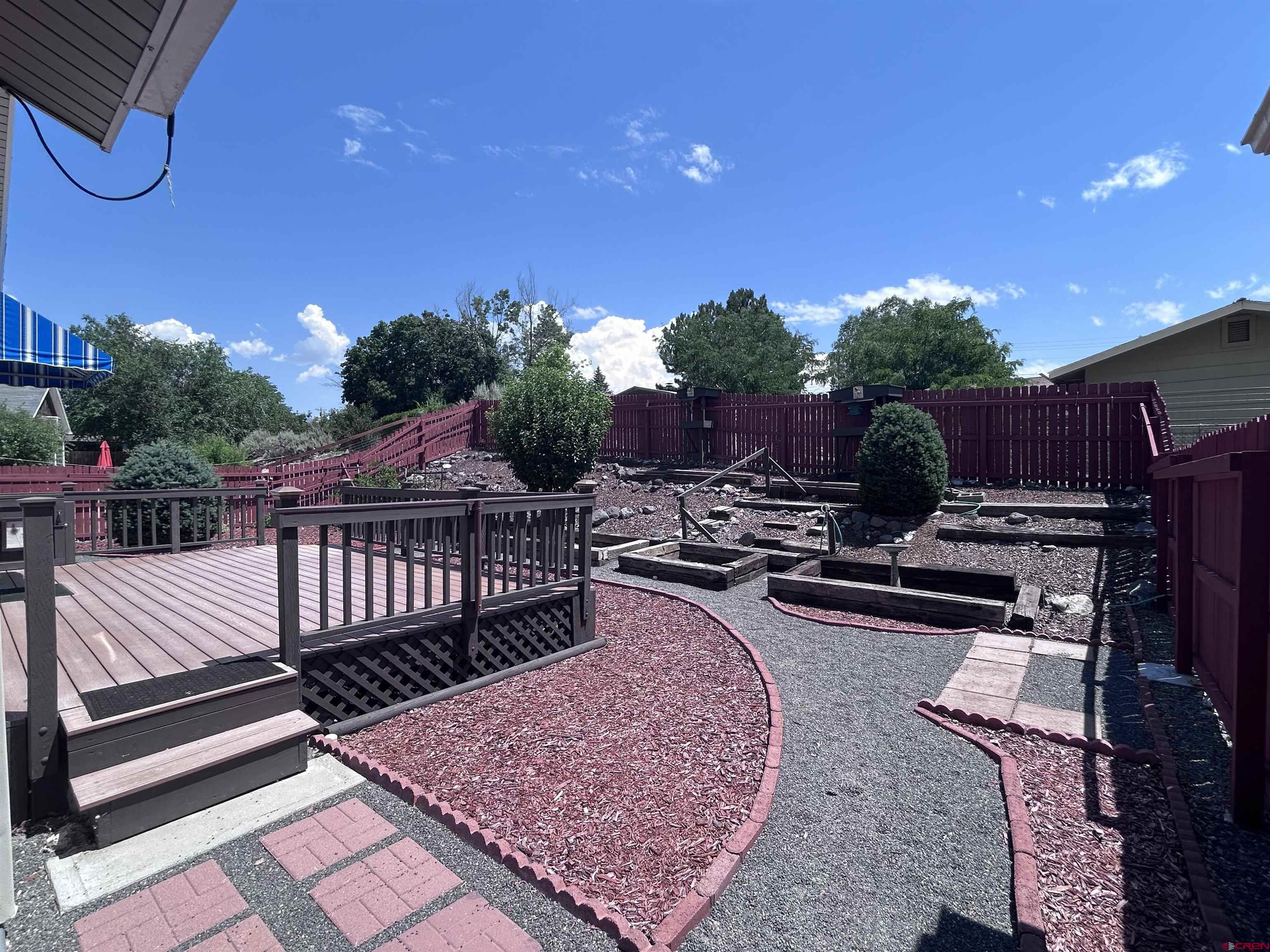 185-165 Northwest 11th Street Cedaredge, CO 81413 - Photo 9 of 34 a view of balcony with wooden floor and outdoor seating