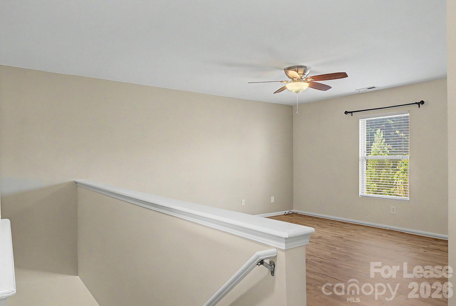 2917 Liddington Road Matthews, NC 28105 - Photo 17 of 44 a view of an empty room and window
