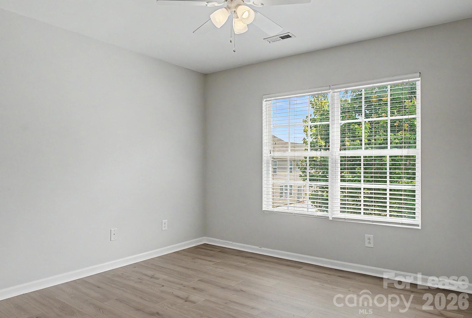 2917 Liddington Road Matthews, NC 28105 - Photo 22 of 44 a view of an empty room with a window