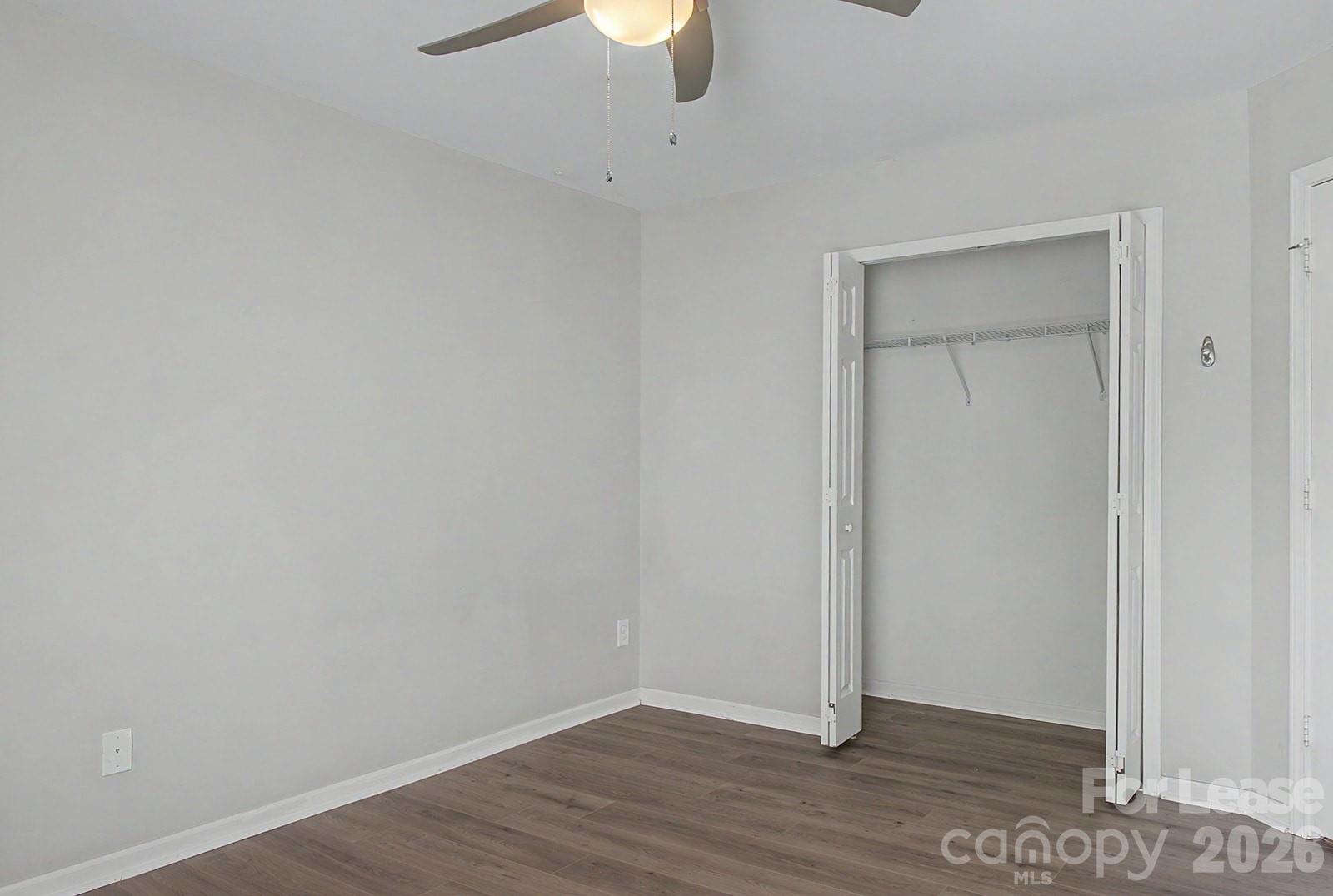 2917 Liddington Road Matthews, NC 28105 - Photo 23 of 44 a view of an empty room with wooden floor