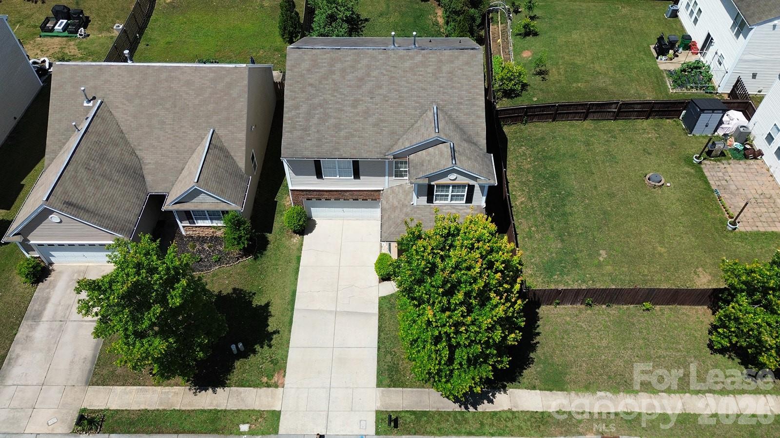 2917 Liddington Road Matthews, NC 28105 - Photo 4 of 44 an aerial view of a house with a garden