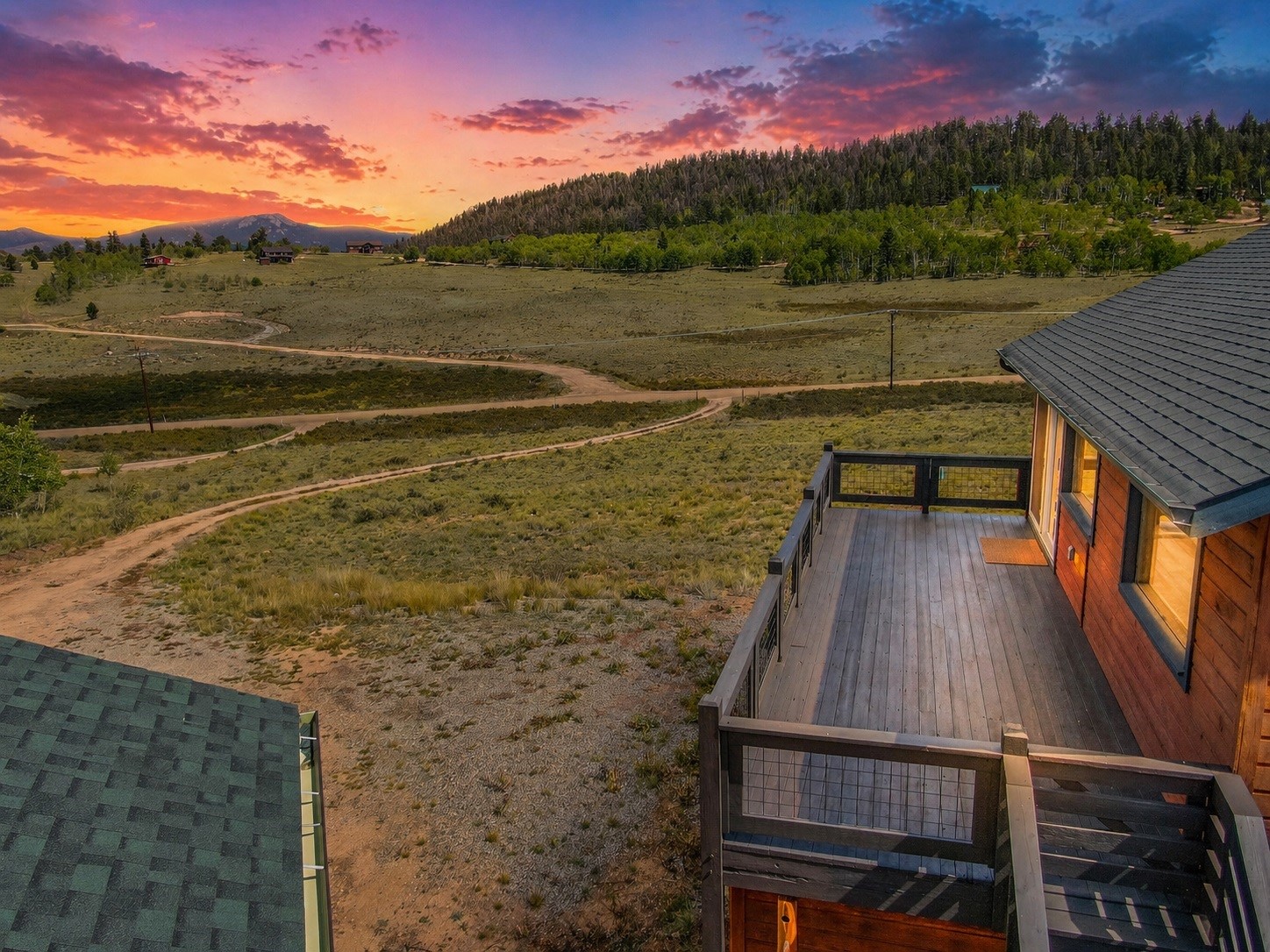 2491 Stagestop Road Jefferson, CO 80456 - Photo 9 of 43 a view of a terrace with a lake view