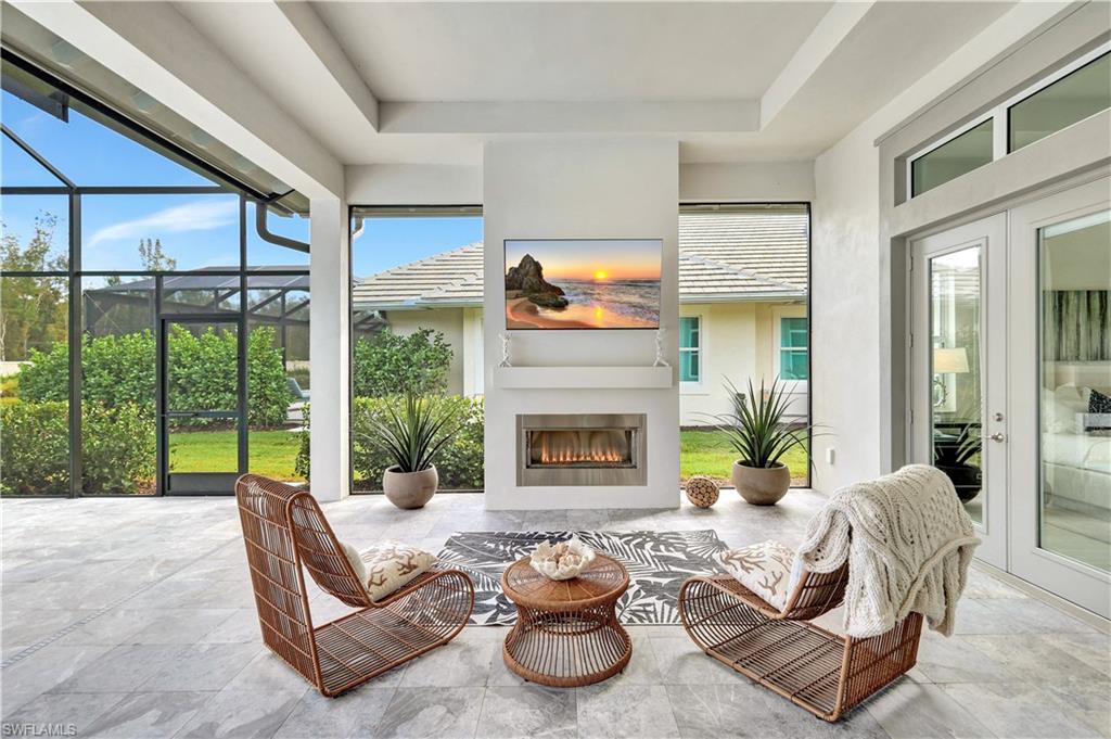 8912 Nevis Way Naples, FL 34112 - Photo 23 of 45 View of sunroom / solarium