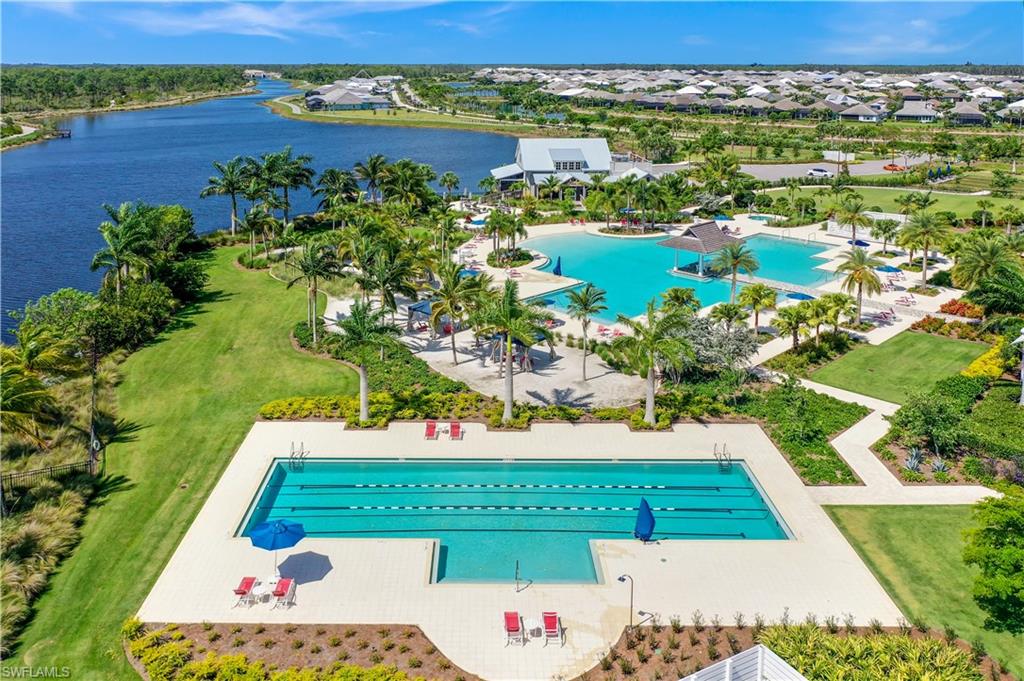 8912 Nevis Way Naples, FL 34112 - Photo 43 of 45 Drone / aerial view of Lap Pool area and a large body of water