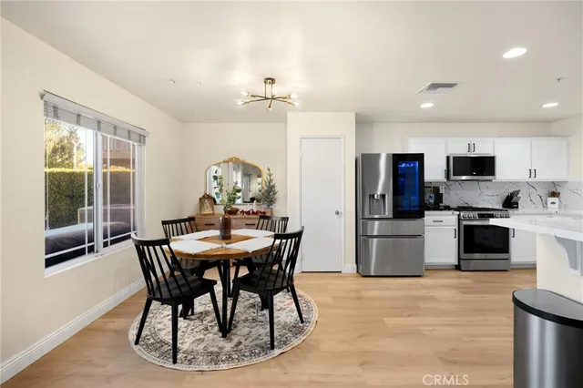 a view of a dining room with furniture