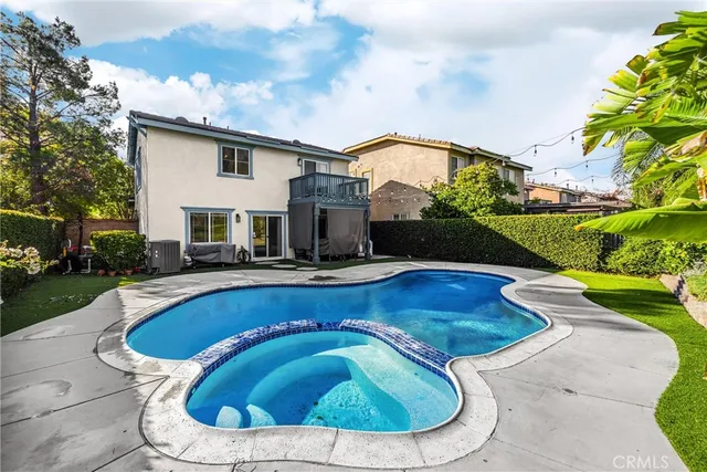 a view of a house with swimming pool