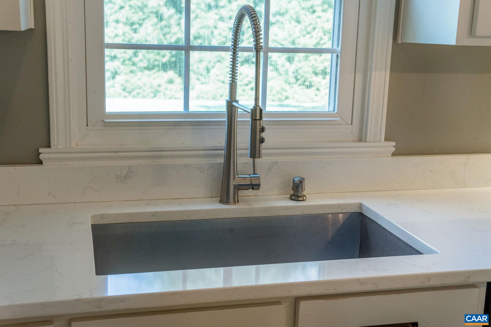 2160 Devonshire Road Charlottesville, VA 22901 - Photo 16 of 43 a view of a sink and a window