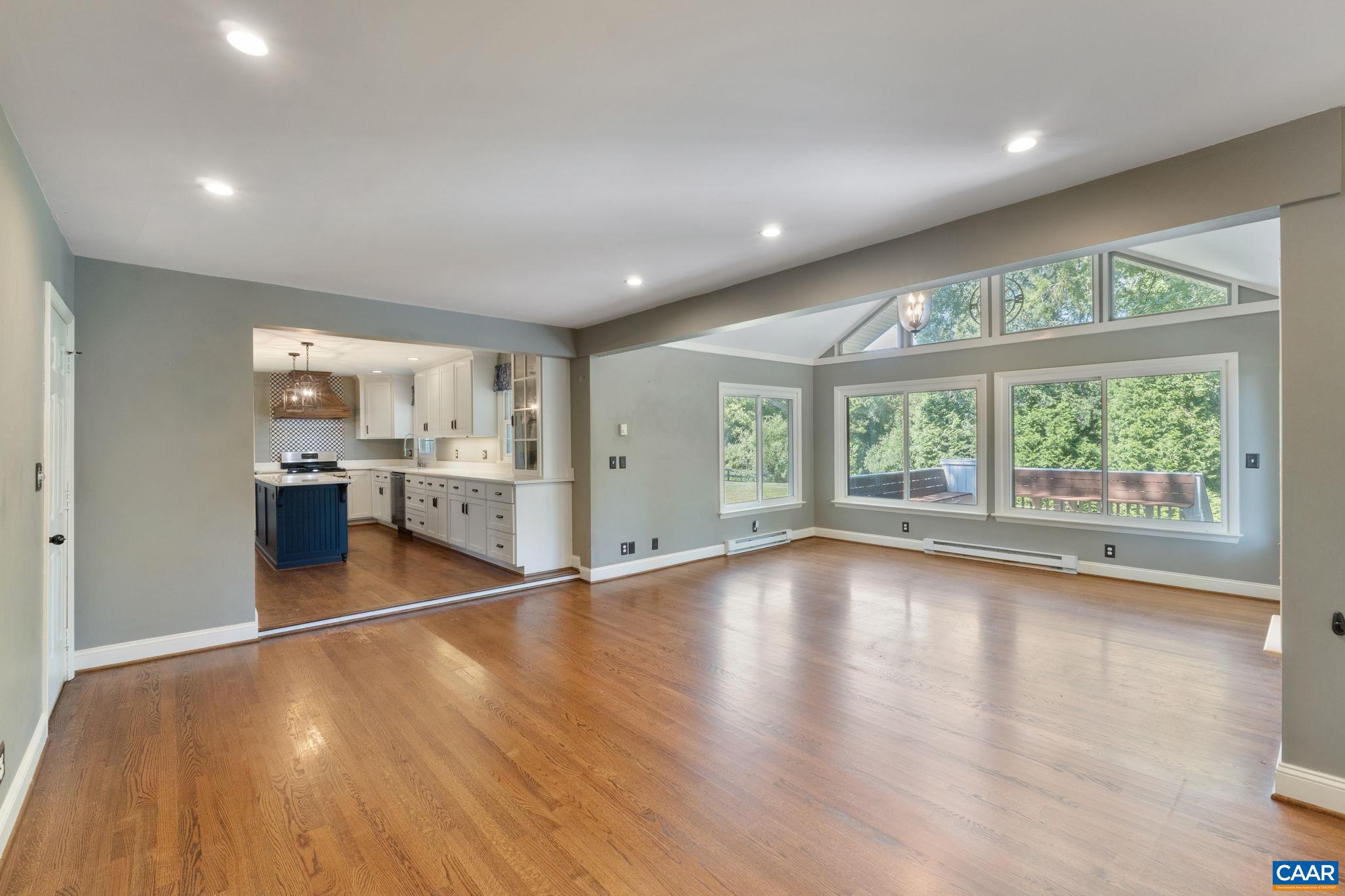 2160 Devonshire Road Charlottesville, VA 22901 - Photo 21 of 43 a view of empty room with wooden floor and fireplace