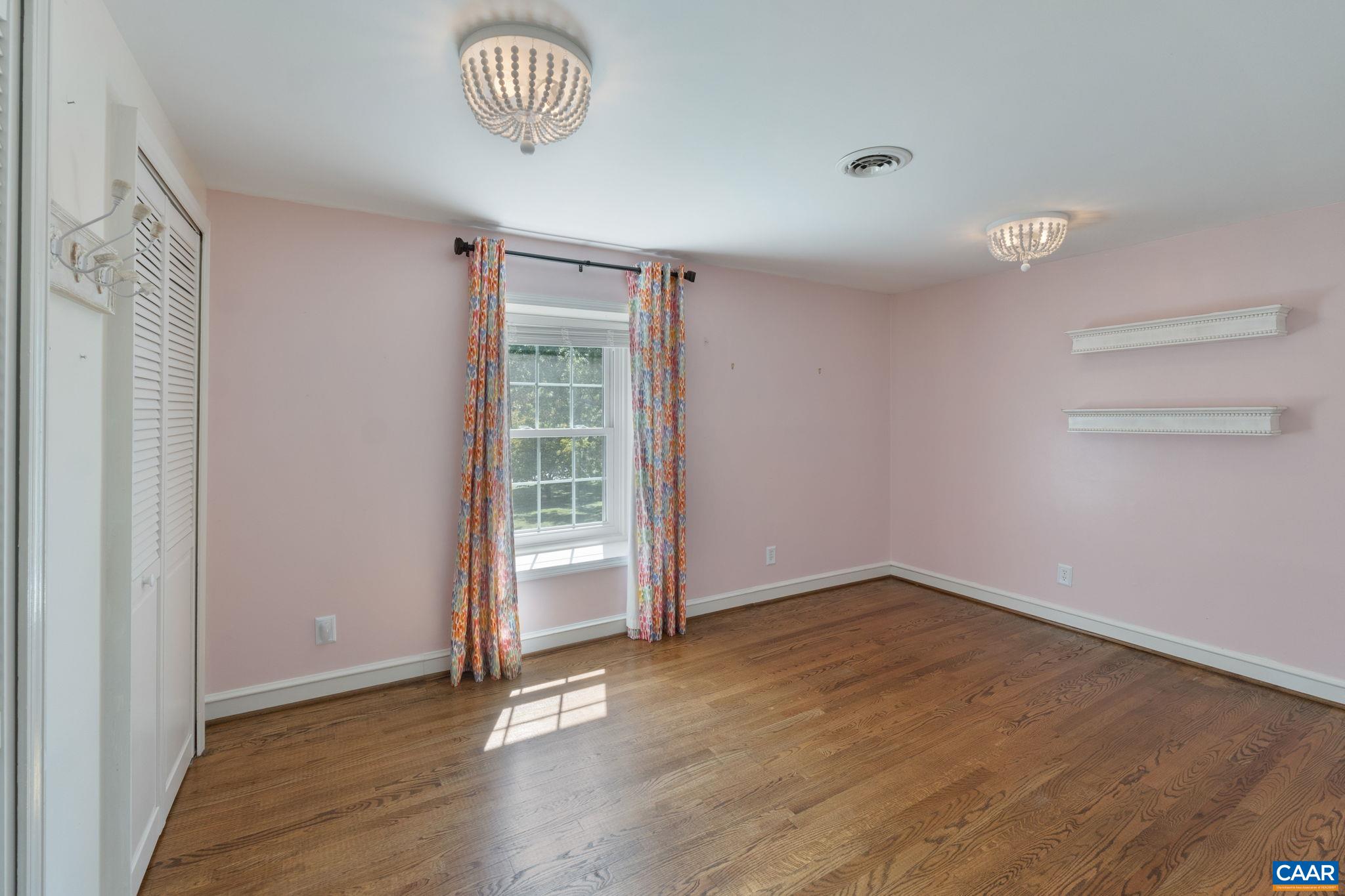 2160 Devonshire Road Charlottesville, VA 22901 - Photo 33 of 43 an empty room with a door