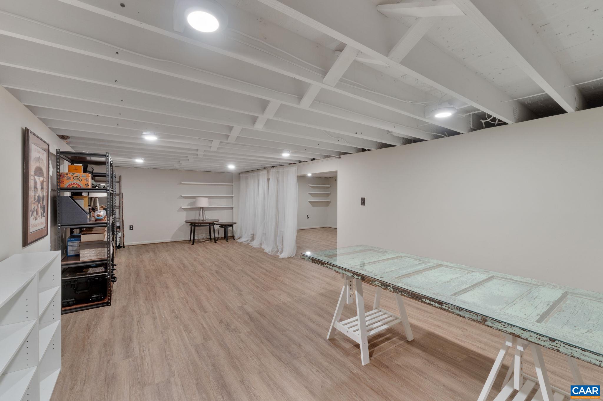 2160 Devonshire Road Charlottesville, VA 22901 - Photo 35 of 43 a view of a hall with wooden floor