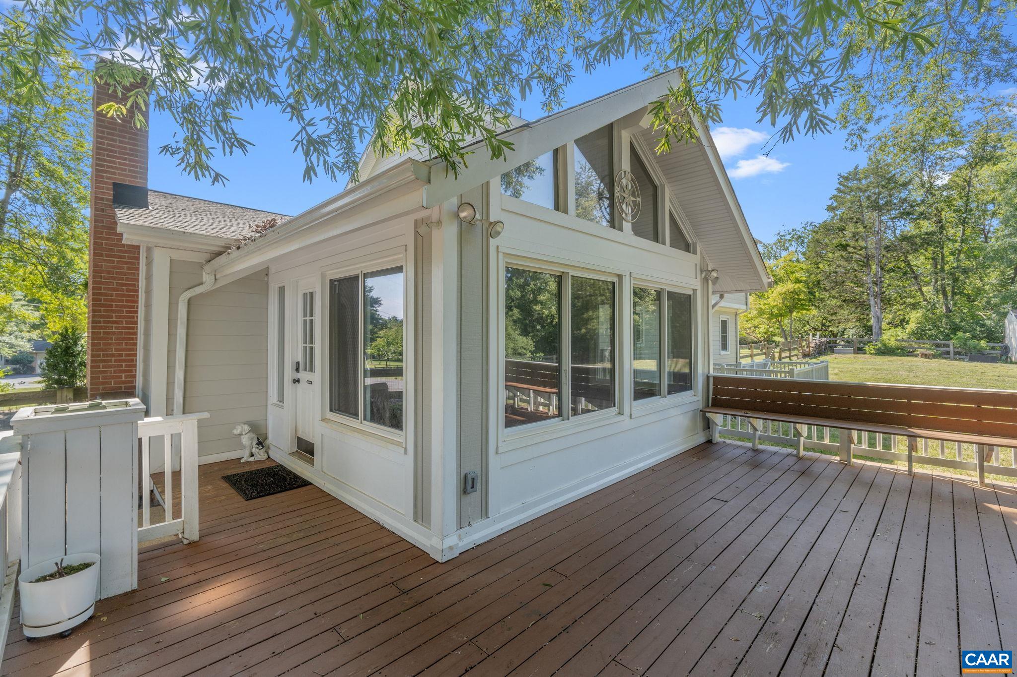2160 Devonshire Road Charlottesville, VA 22901 - Photo 38 of 43 a view of a house with wooden floor next to a yard