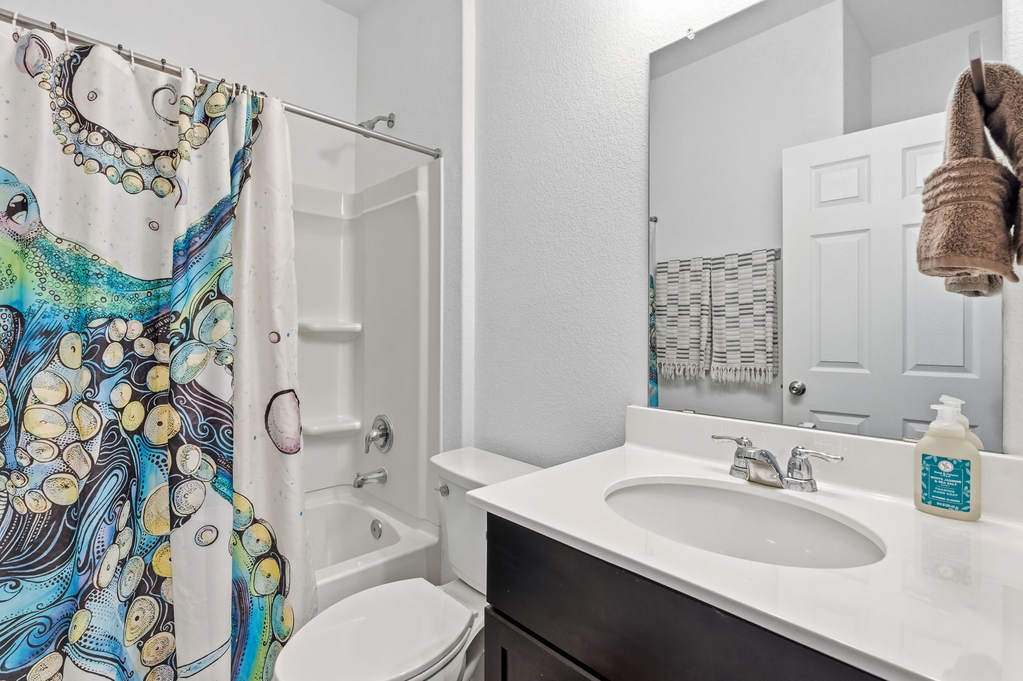 1600 Hope Rnch Road Leander, TX 78641 - Photo 20 of 23 a bathroom with a sink vanity granite and toilet
