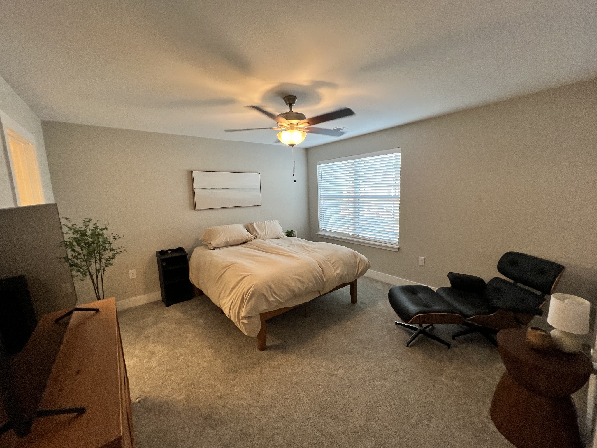 1040 Wells Way Spring Hill, TN 37174 - Photo 11 of 36 a bedroom with a bed gym equipment and a window