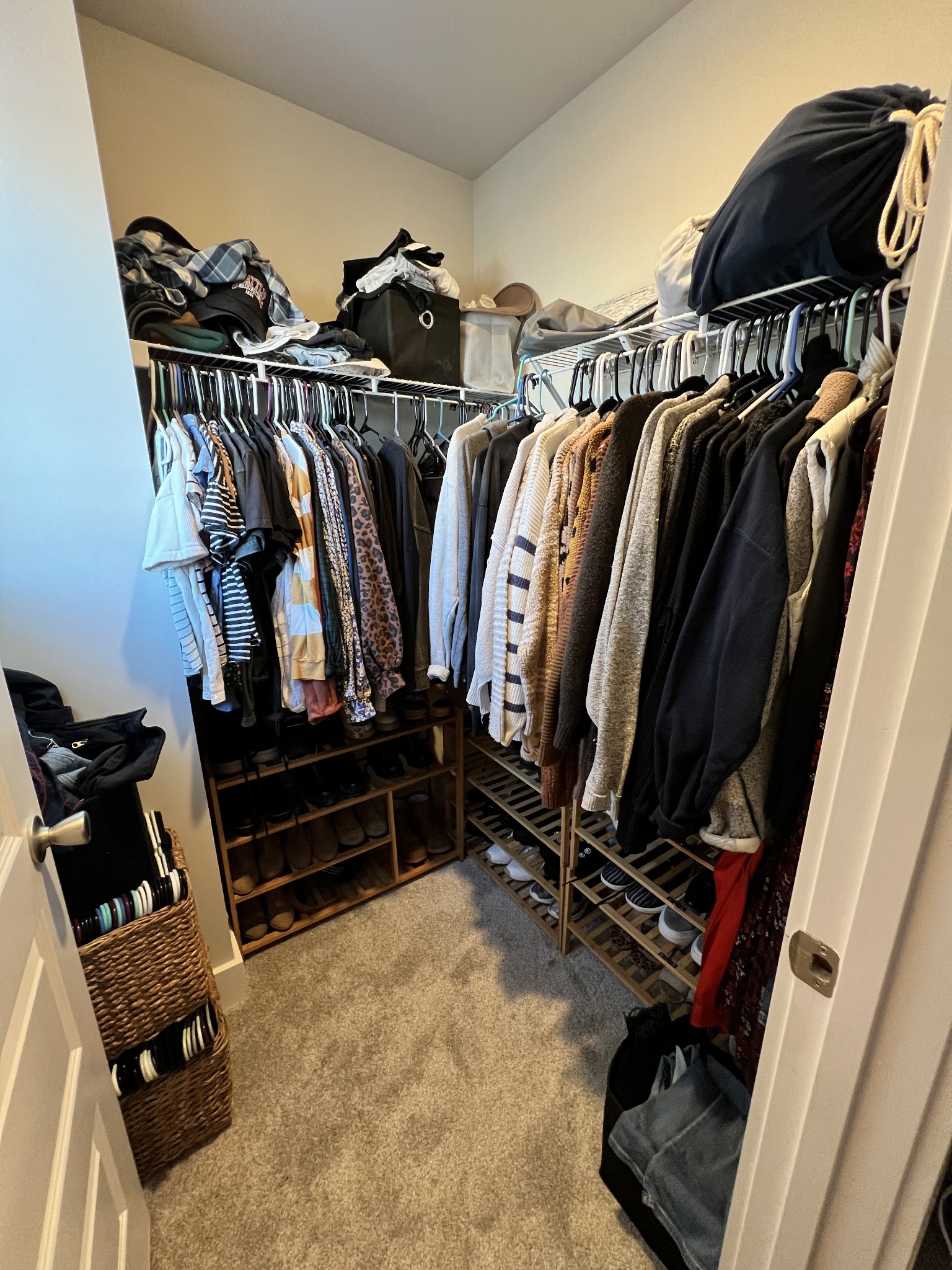 1040 Wells Way Spring Hill, TN 37174 - Photo 14 of 36 a view of walk in closet with clothes and shoes