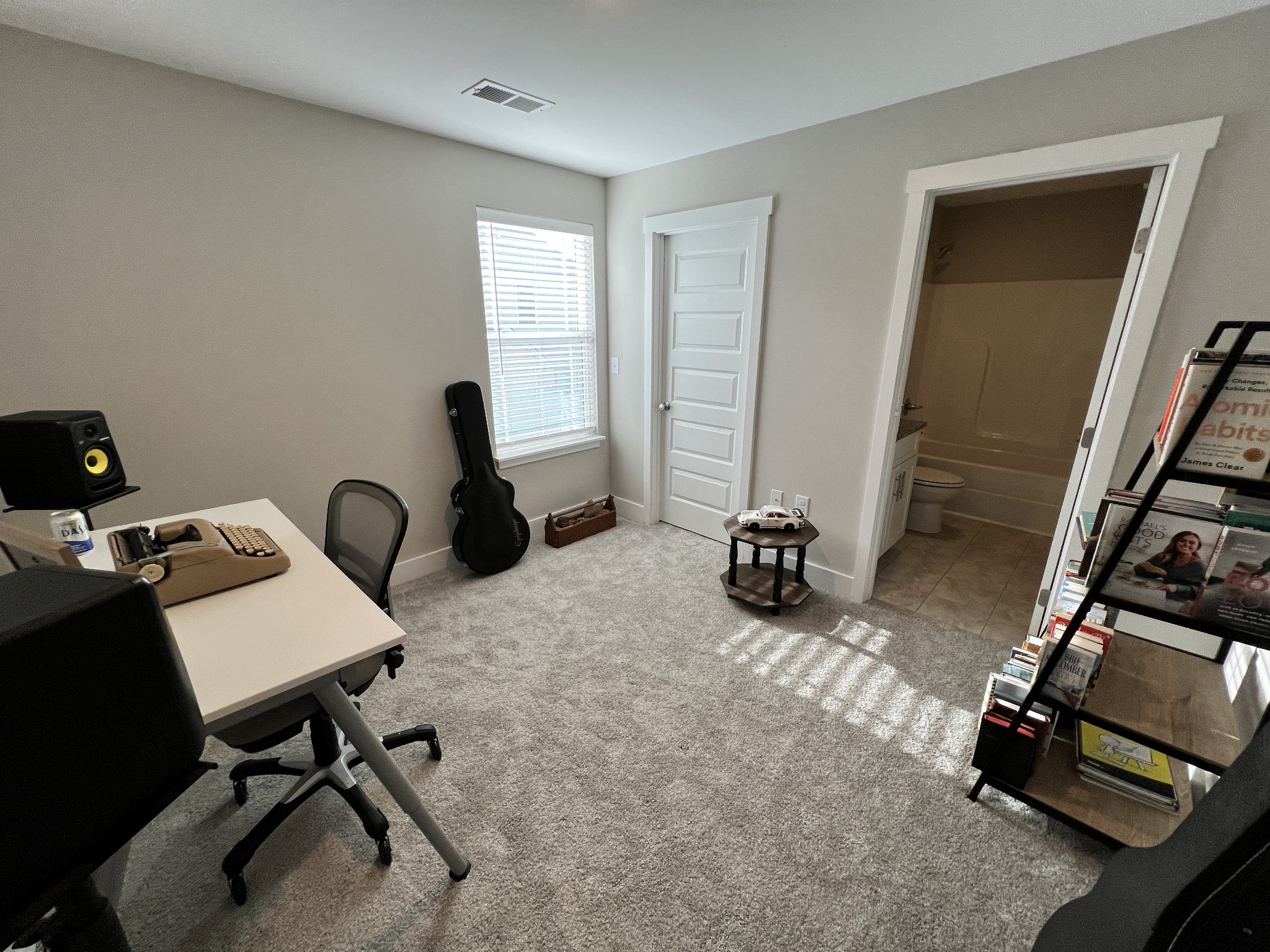 1040 Wells Way Spring Hill, TN 37174 - Photo 18 of 36 a view of a workspace with furniture and a window