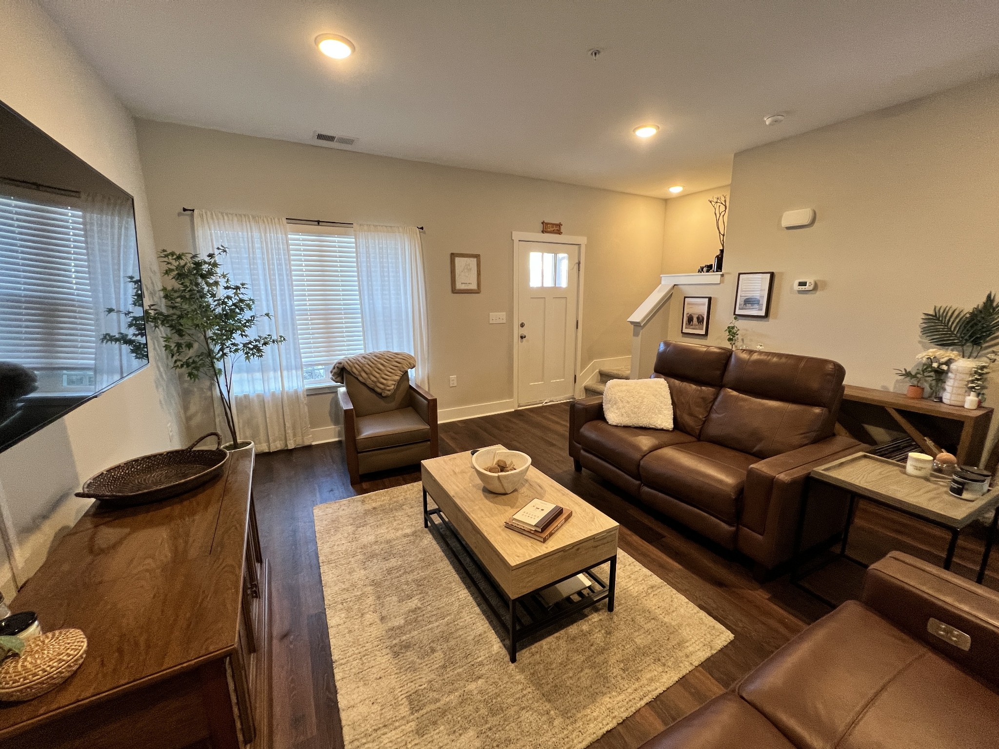 1040 Wells Way Spring Hill, TN 37174 - Photo 3 of 36 a living room with furniture and a wooden floor