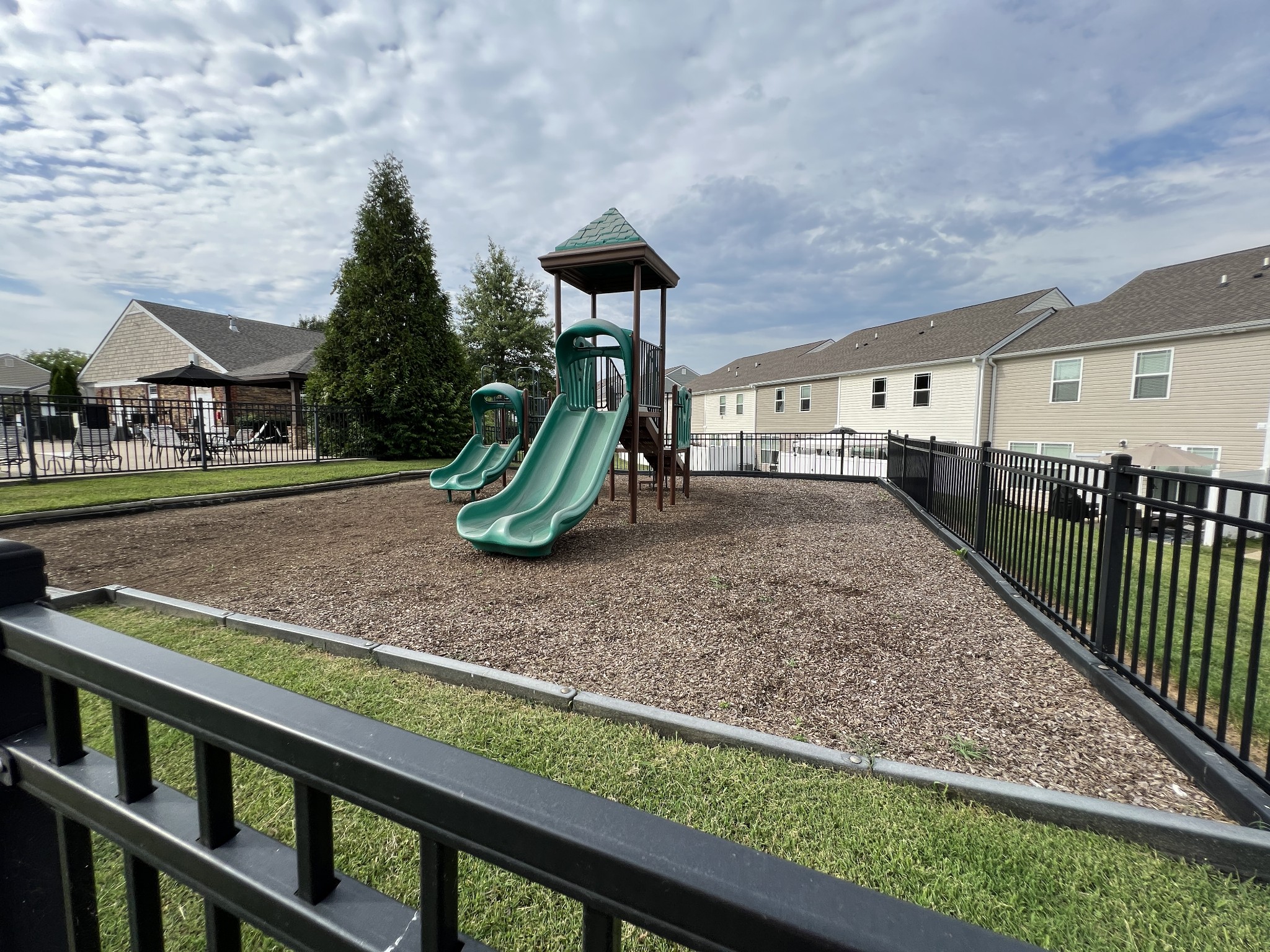 1040 Wells Way Spring Hill, TN 37174 - Photo 31 of 36 a childrens park with lots of swings and slides