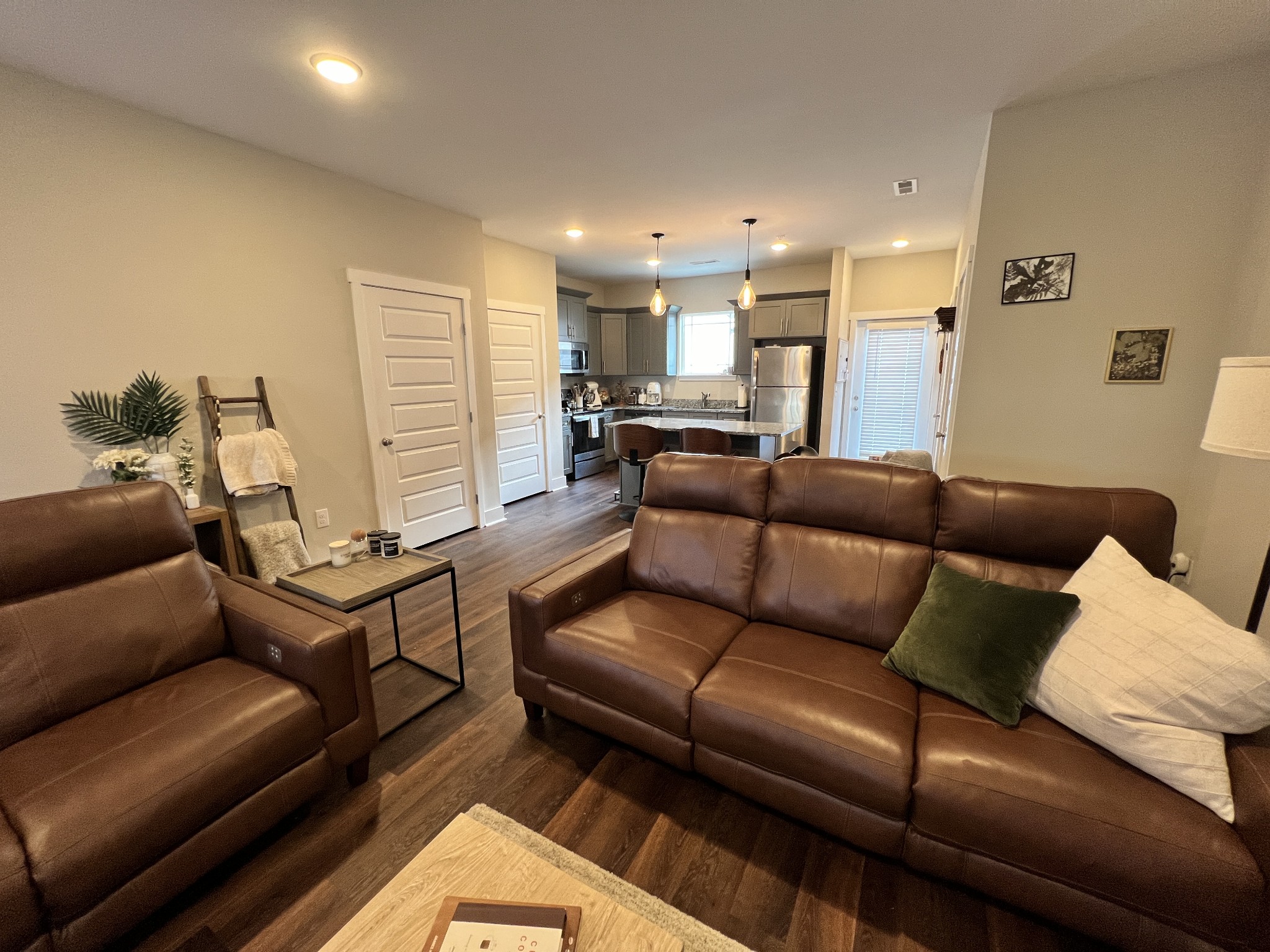 1040 Wells Way Spring Hill, TN 37174 - Photo 4 of 36 a living room with furniture and a wooden floor