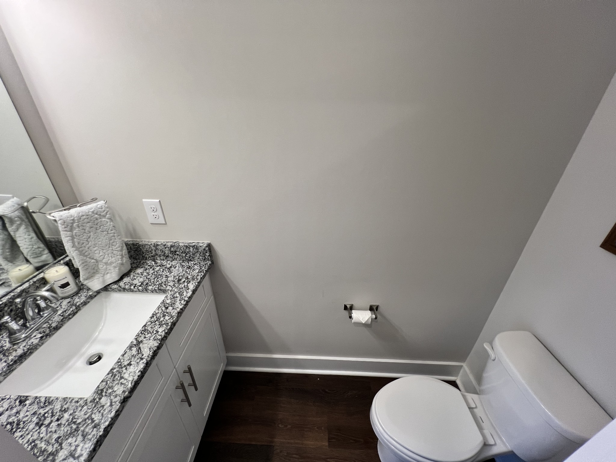 1040 Wells Way Spring Hill, TN 37174 - Photo 8 of 36 a bathroom with a granite countertop toilet and a sink