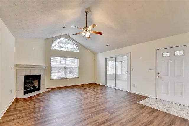 a kitchen with stainless steel appliances granite countertop a refrigerator stove and sink